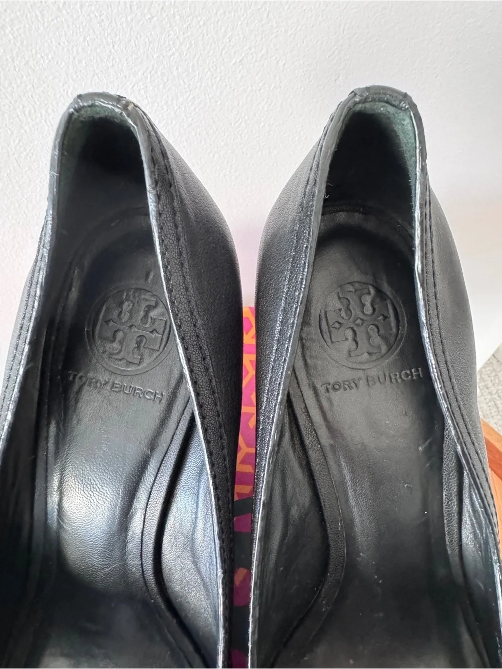 Tory Burch Black Peep-Toe Wedge Pumps with Gold Logo Medallion